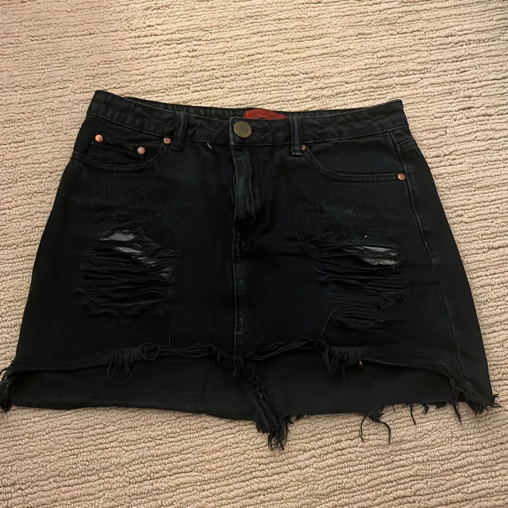 Black distressed denim skirt